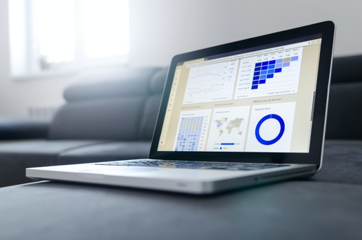 A computer with a google analytics dashboard